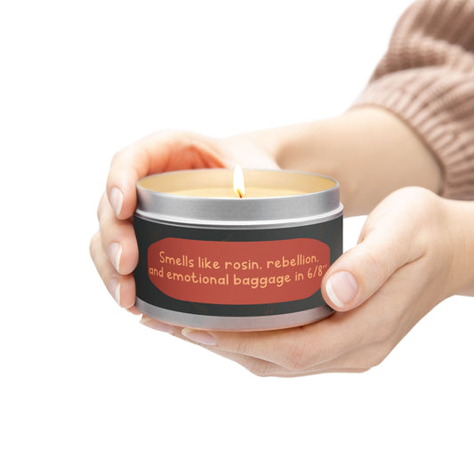Smells like rosin, rebellion, and emotional baggage in 6/8" -Tin Candle