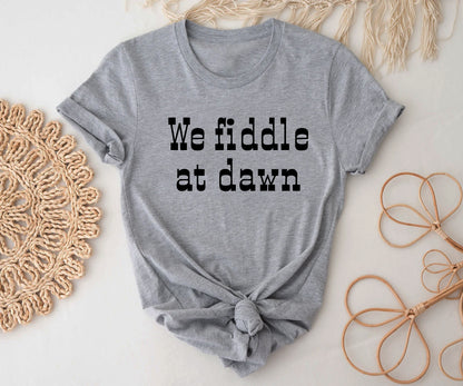 We fiddle at dawn