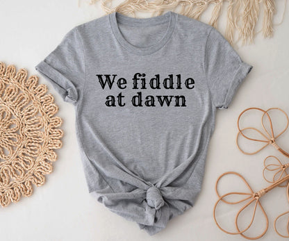 We fiddle at dawn