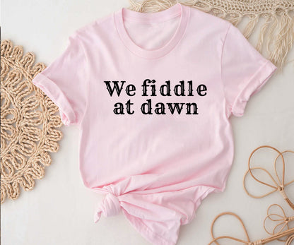 We fiddle at dawn