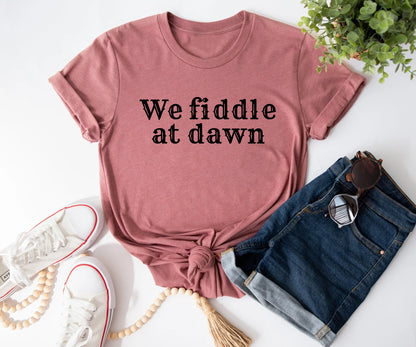We fiddle at dawn